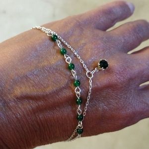 Emerald and silver anklet bracelet.